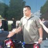 Ron Rushia greeting an Iraq vet who is a double amputee